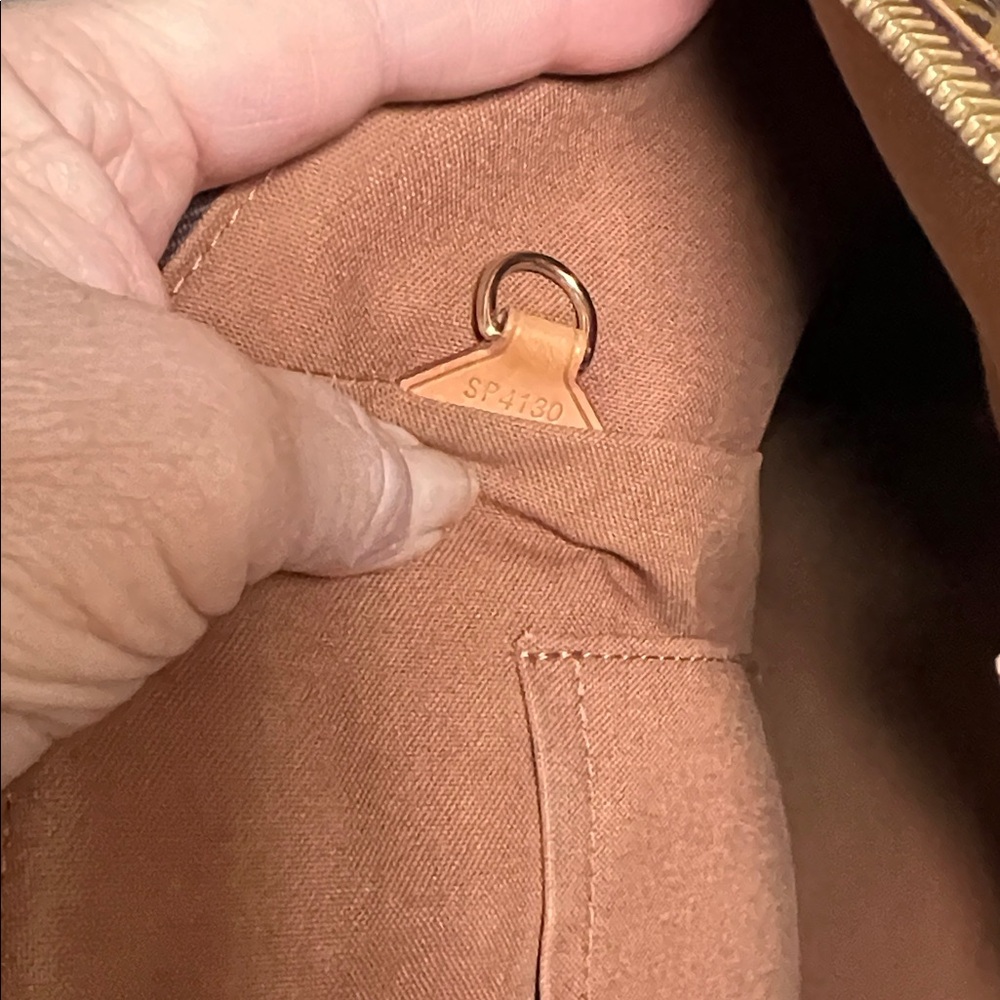 Louis Vuitton Tivoli GM bag in Monogram Canvas. - Picture 10 of 10